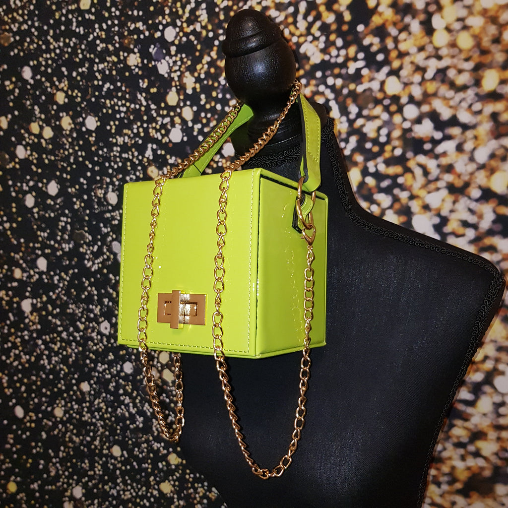 ALDO Shoes - With an iridescent neon finish and snake print embossing, this  sizzling summer handbag is almost too hot to handle! Shop now:  http://bit.ly/aldoselect | Facebook